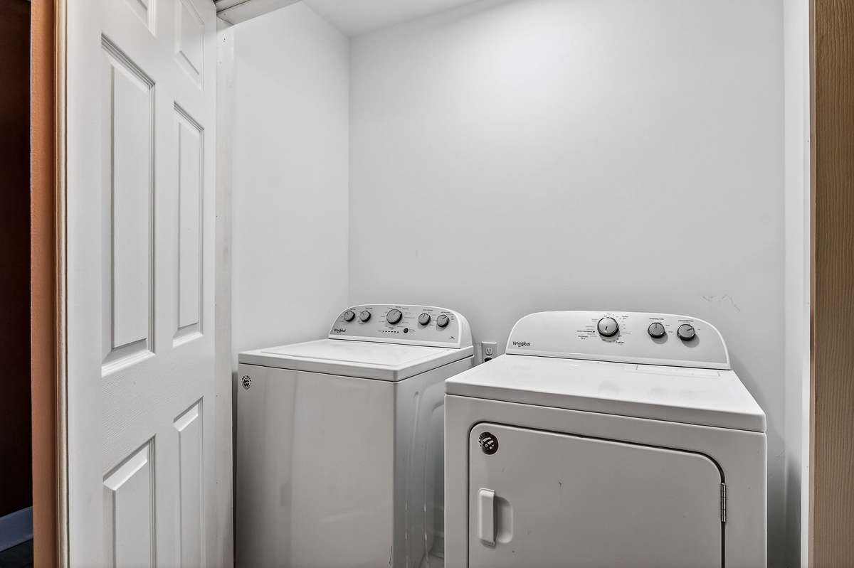 This guest bath also has laundry closet