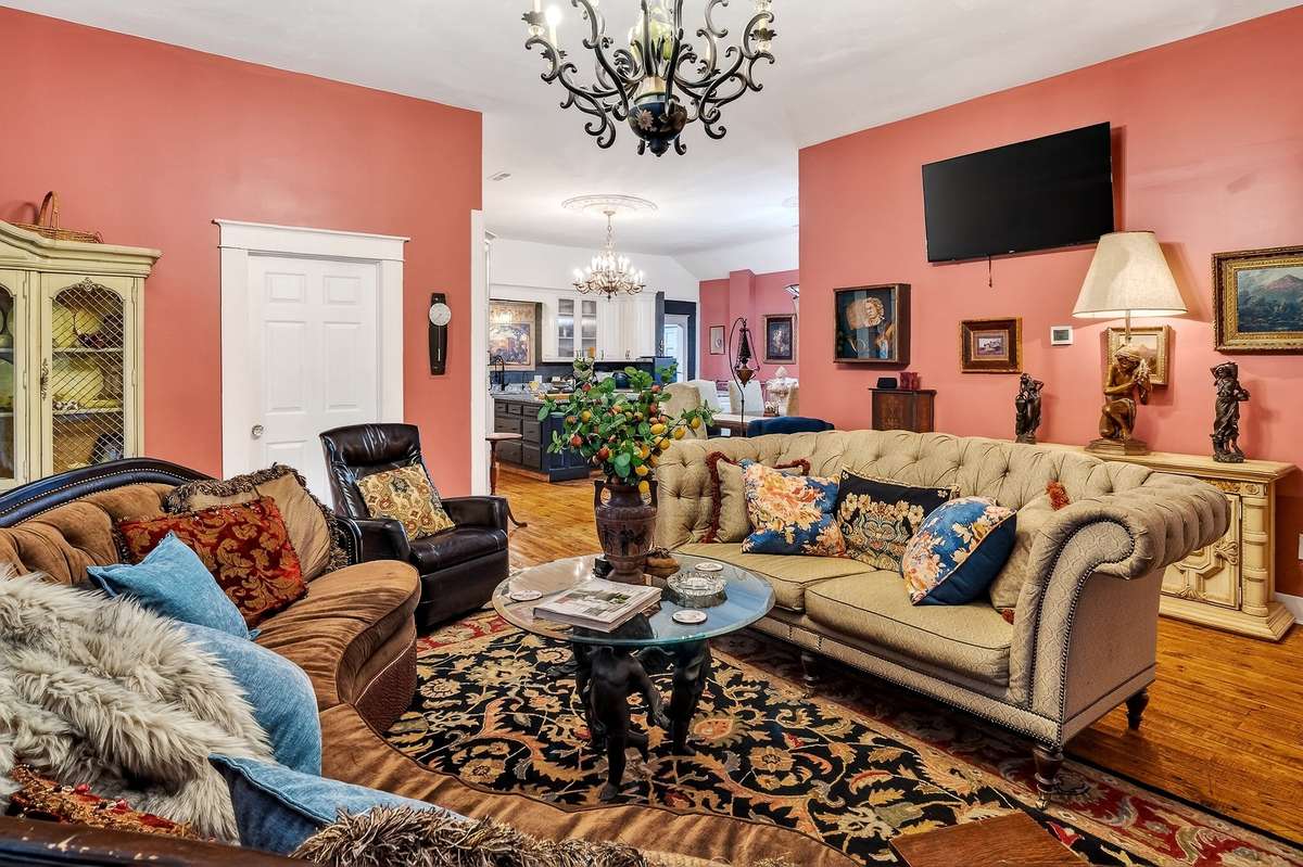 This  beautiful old church conversion home has original pine flooring with luxury charm that shows in every room.