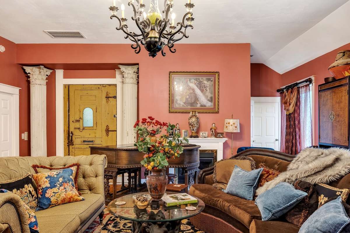 This home boasts an infusion of Old World styling. A touch of France meets Italy with classic design to a simple country comfort.