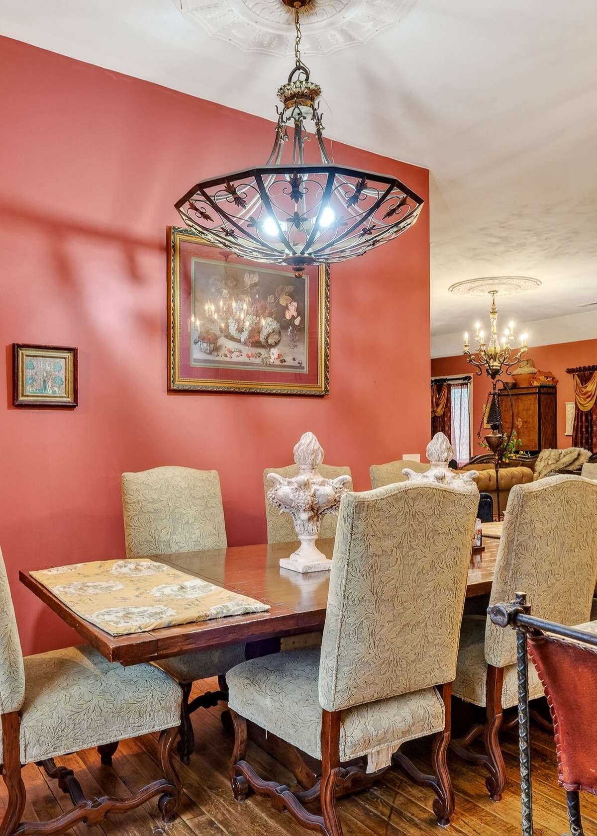 This large Tuscan table and chairs seats 8-10 and also stays with the home.