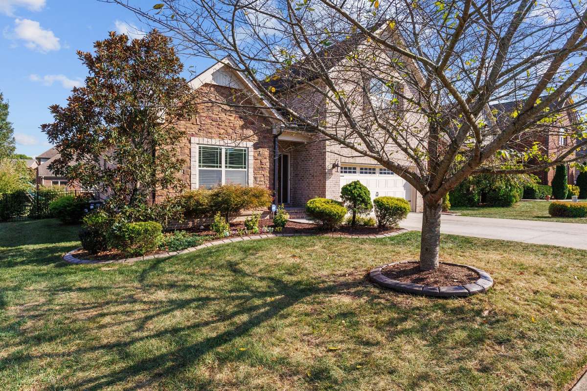 Beautifully crafted brick home with classic curb appeal and lasting elegance