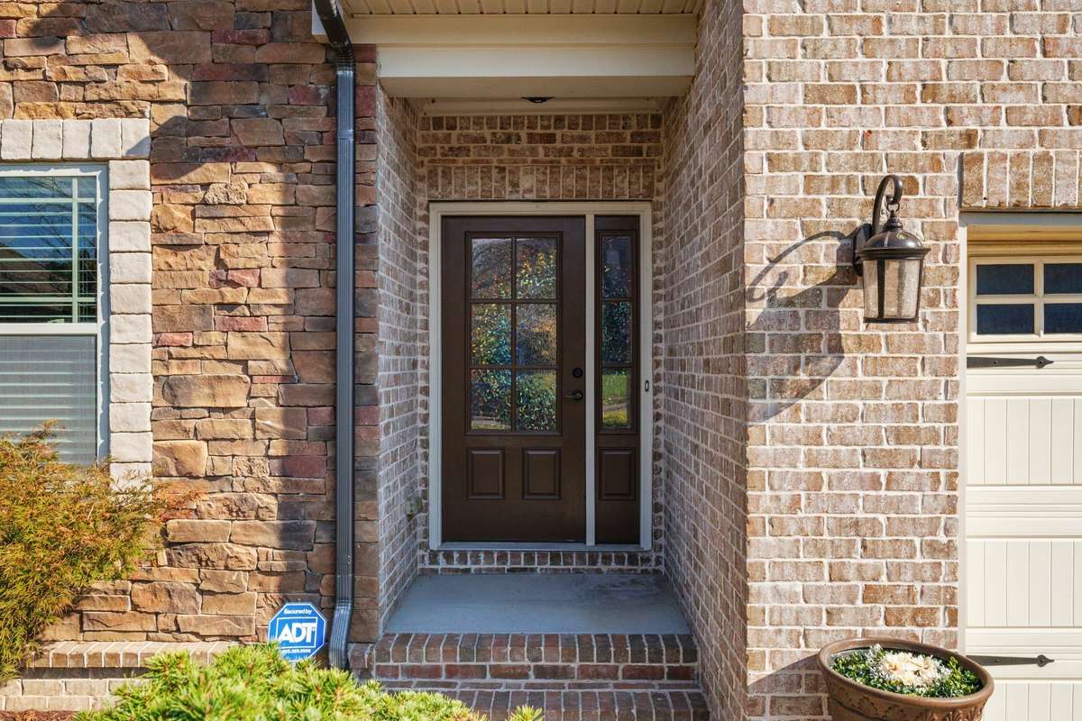 Step onto your covered front porch and feel instantly at home!