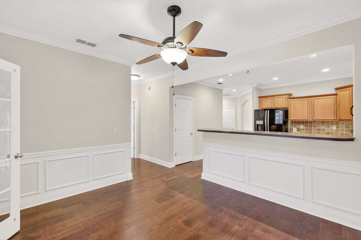 Extra seating could be achieved by adding Stools to the Kitchen Bar area.
