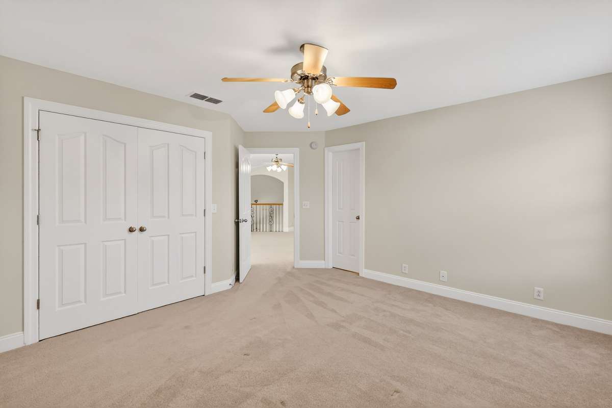 Bedroom 2 has a nice-sized closet with double doors and access to hall bathroom.
