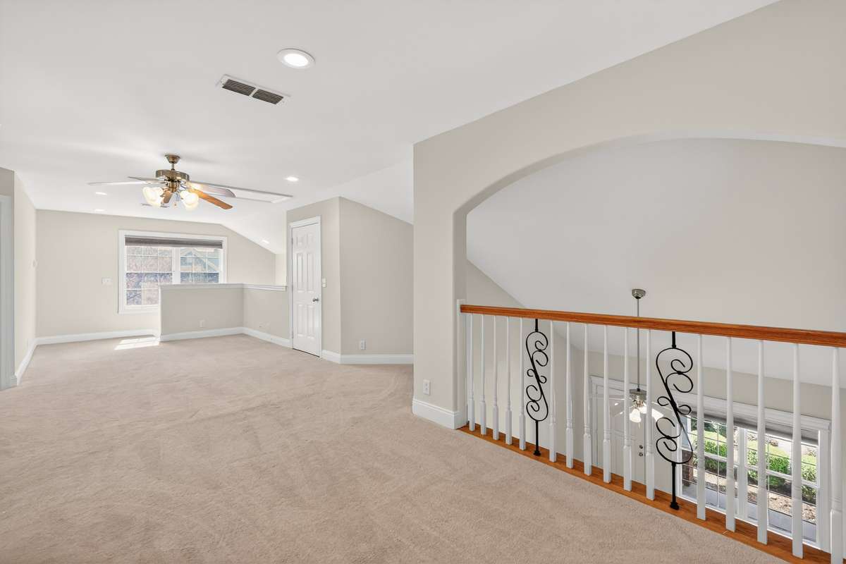 In the Bonus area there is Walk-out attic access where storage is abundant and there is an additional attic access which has pull down stairs from the ceiling.