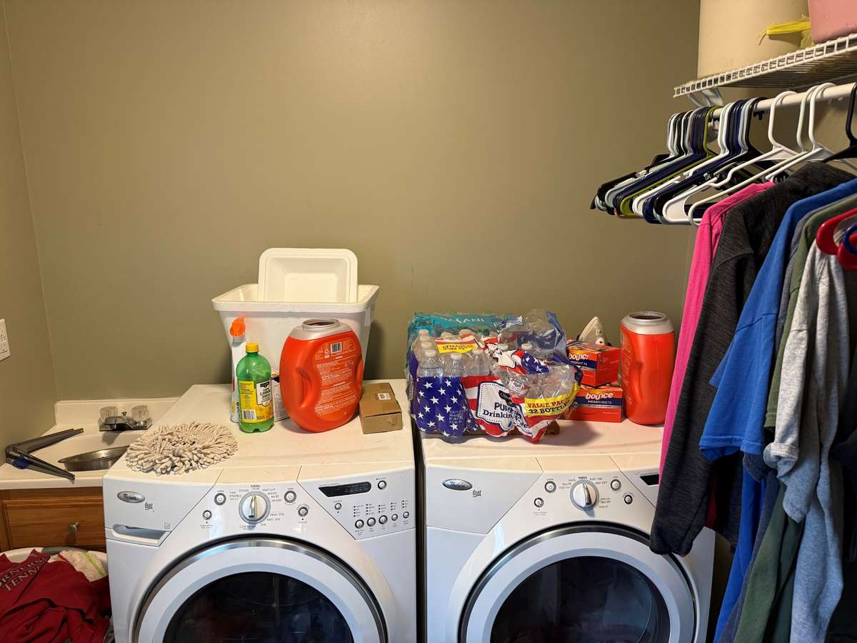 Laundry Room- wire shelving, sink with cabinet