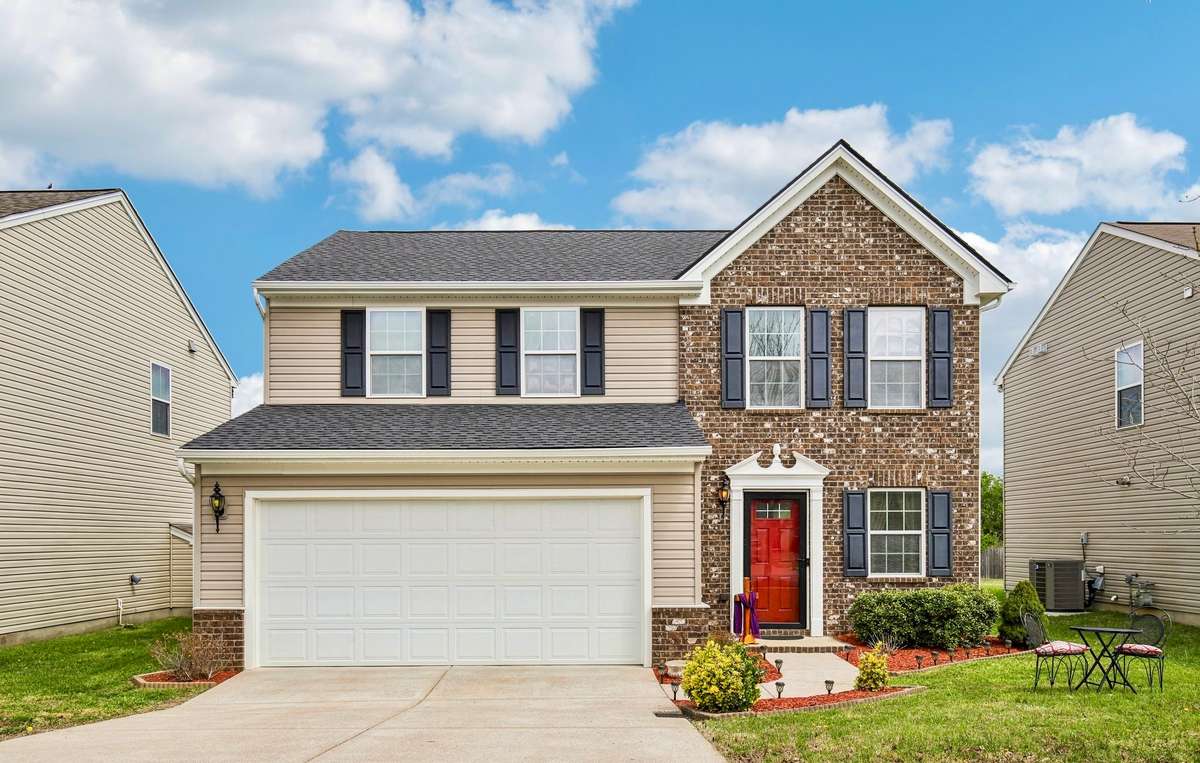 Classic curb appeal meets everyday comfort with this well-maintained Bellevue home featuring a two-car garage and inviting front entry.