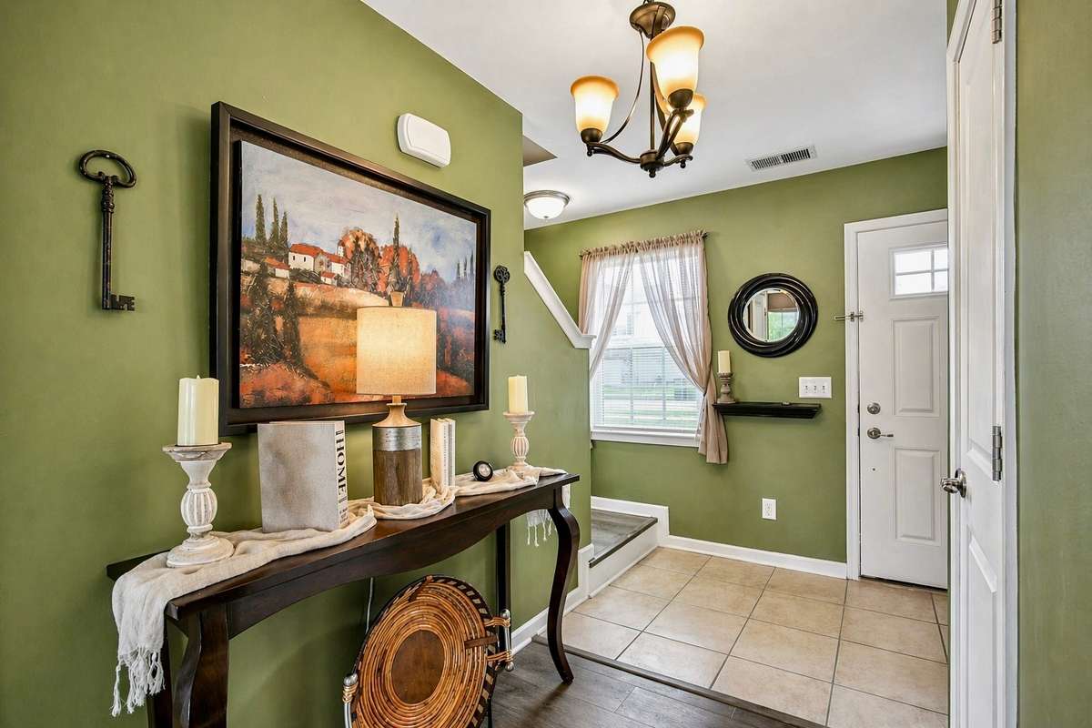 Inviting foyer with a light-filled feel and thoughtful layout, offering a comfortable and connected entry into the home.