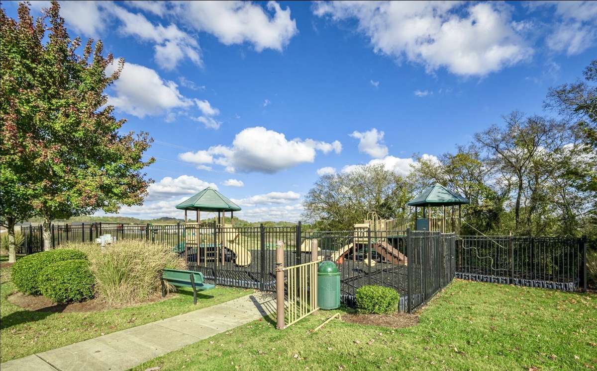 Community playground, perfect for outdoor fun, playtime, and enjoying the neighborhood atmosphere.