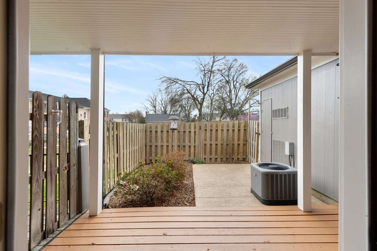 Gated covered deck and patio area w/ storage room. There are additional storage areas in the complex that can be rented.
