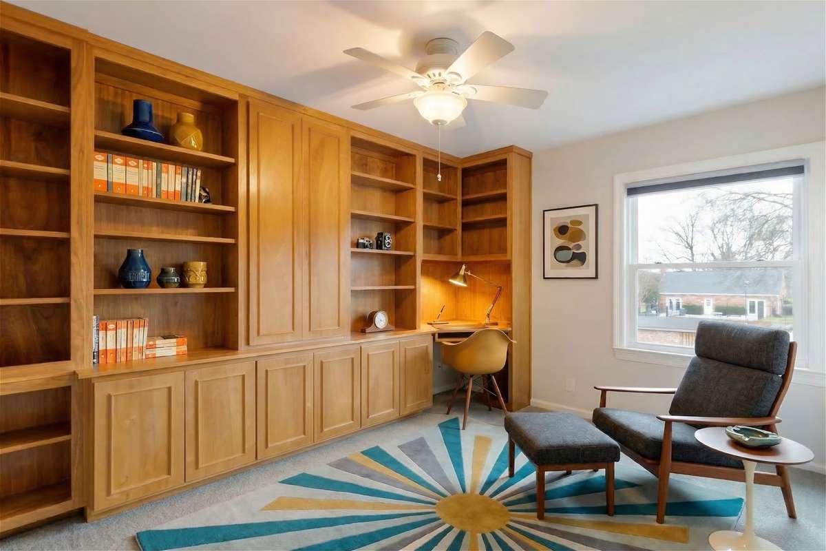 Virtually staged! With custom built-ins, the second bedroom adds space for those who need a home office area or extra bookshelves or storage.