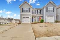 Skip the wait for new construction! Enjoy the privacy of an end unit in this maintenance free townhome offering modern finishes.