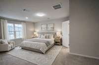 Spacious primary suite (virtually staged)