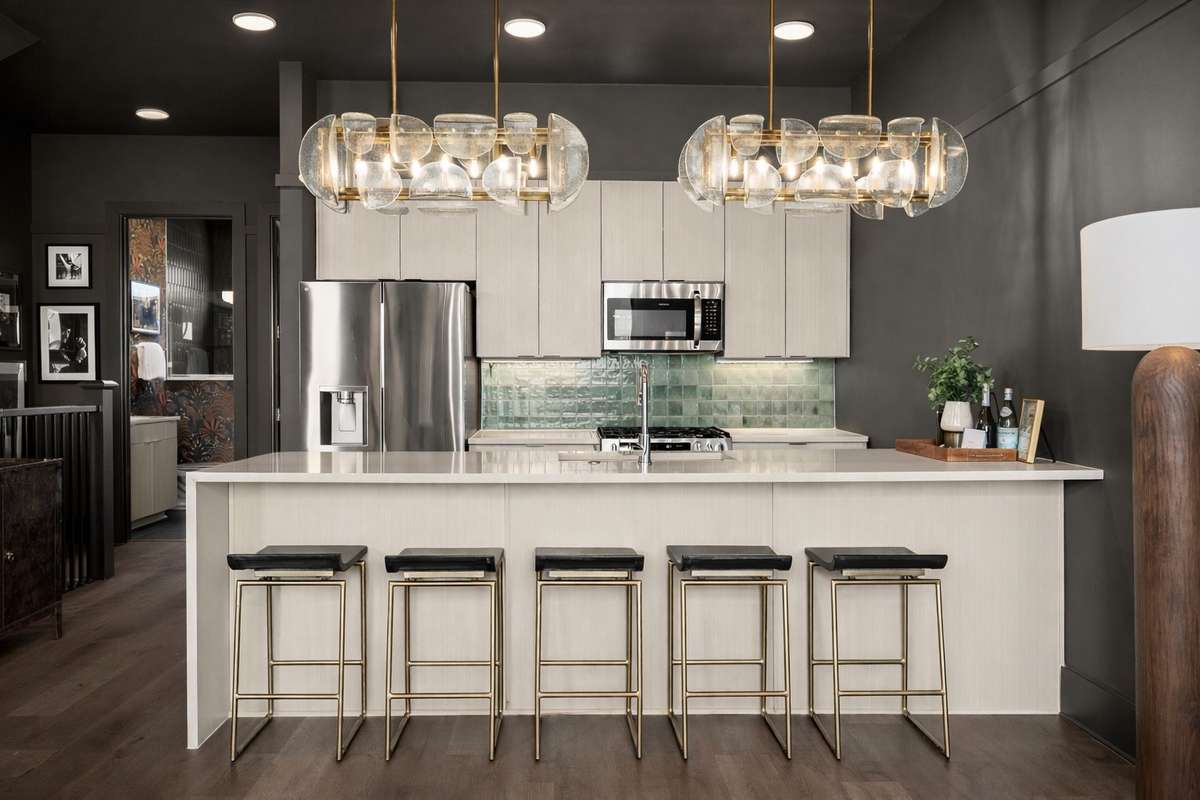 Photos shown are of a similar unit and are for illustrative purposes only. Finishes, features, and layout may vary.