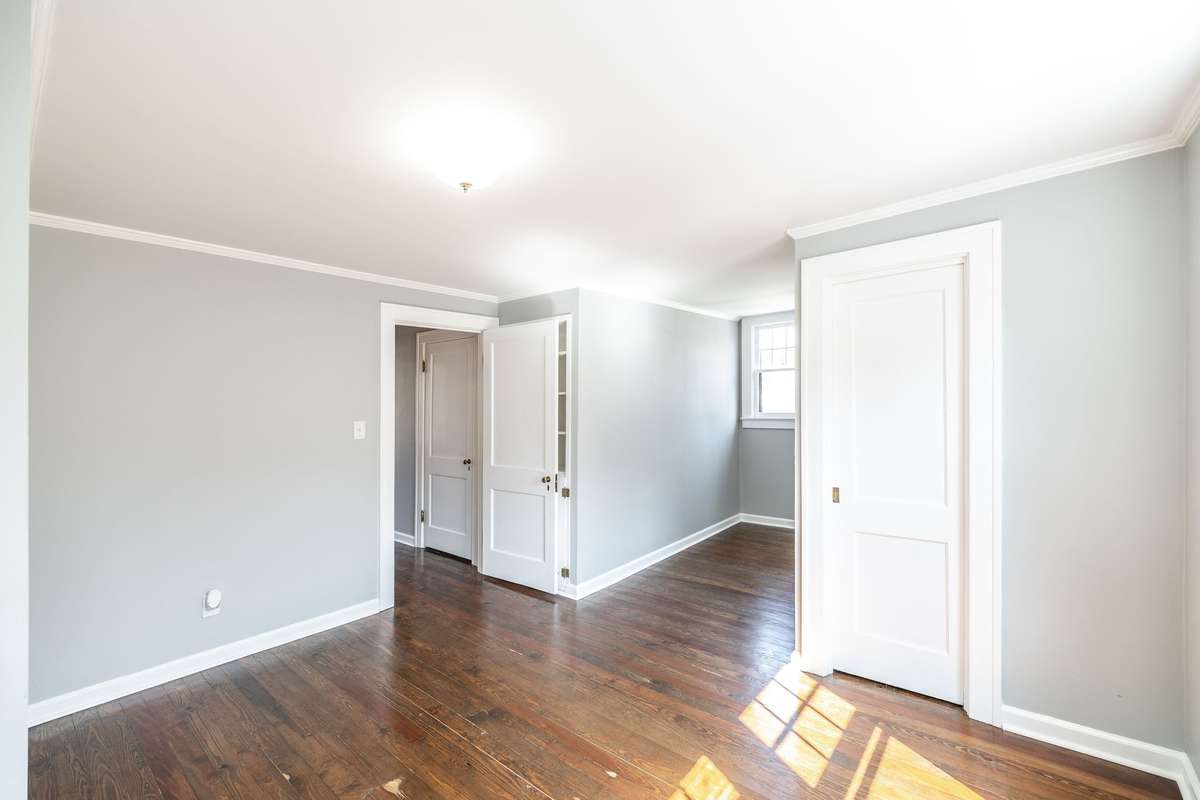 Spacious layout perfect for a guest room, child’s room, or creative space with easy access to the upstairs bath.