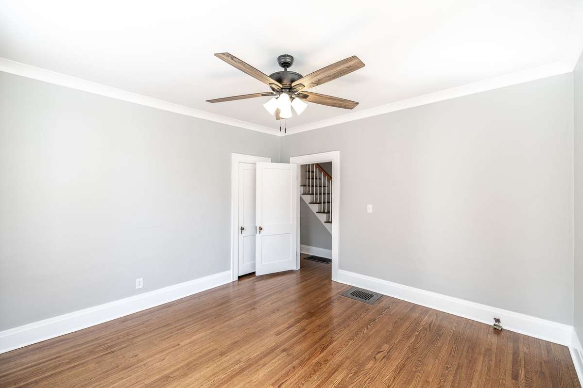 This flexible space offers endless possibilities, located conveniently near the main level bath for added functionality