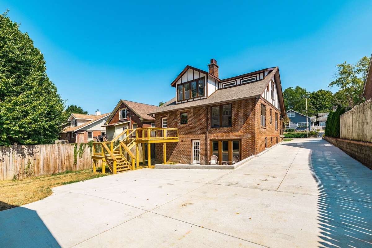 Here is a view of the back of the home showing plenty of options for outdoor entertaining and parking.