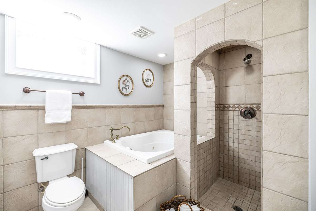 There is a soak tub and separate shower.
