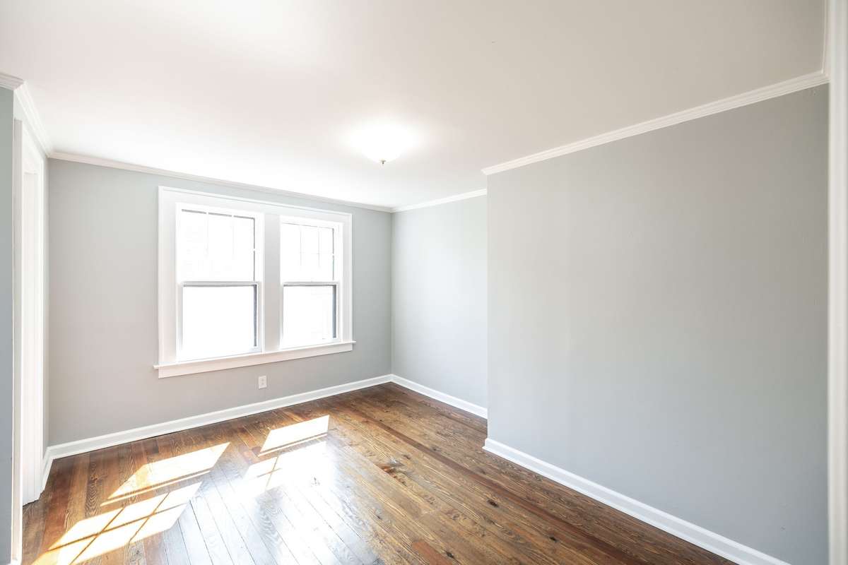 Upstairs bedrooms have hardwood floors and great natural light, creating a bright and welcoming space