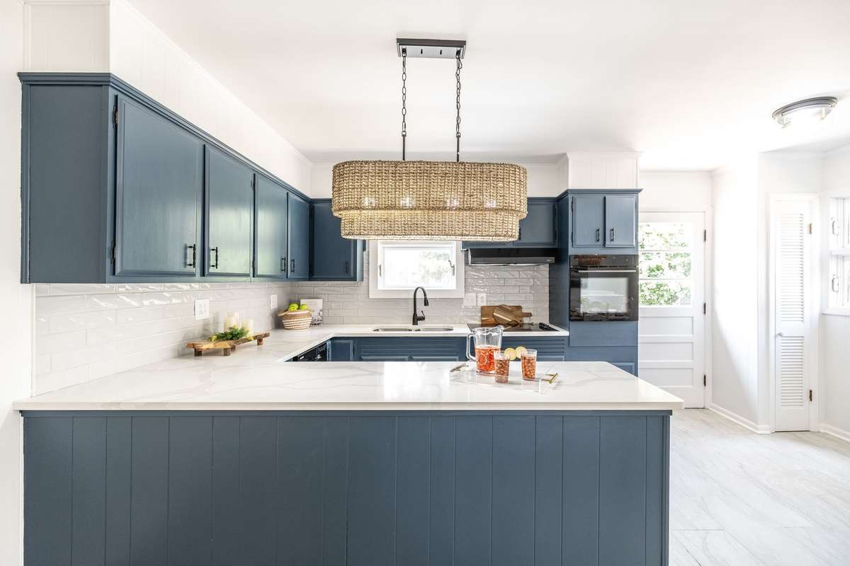 Tile backsplash adds charm and texture to this quaint kitchen