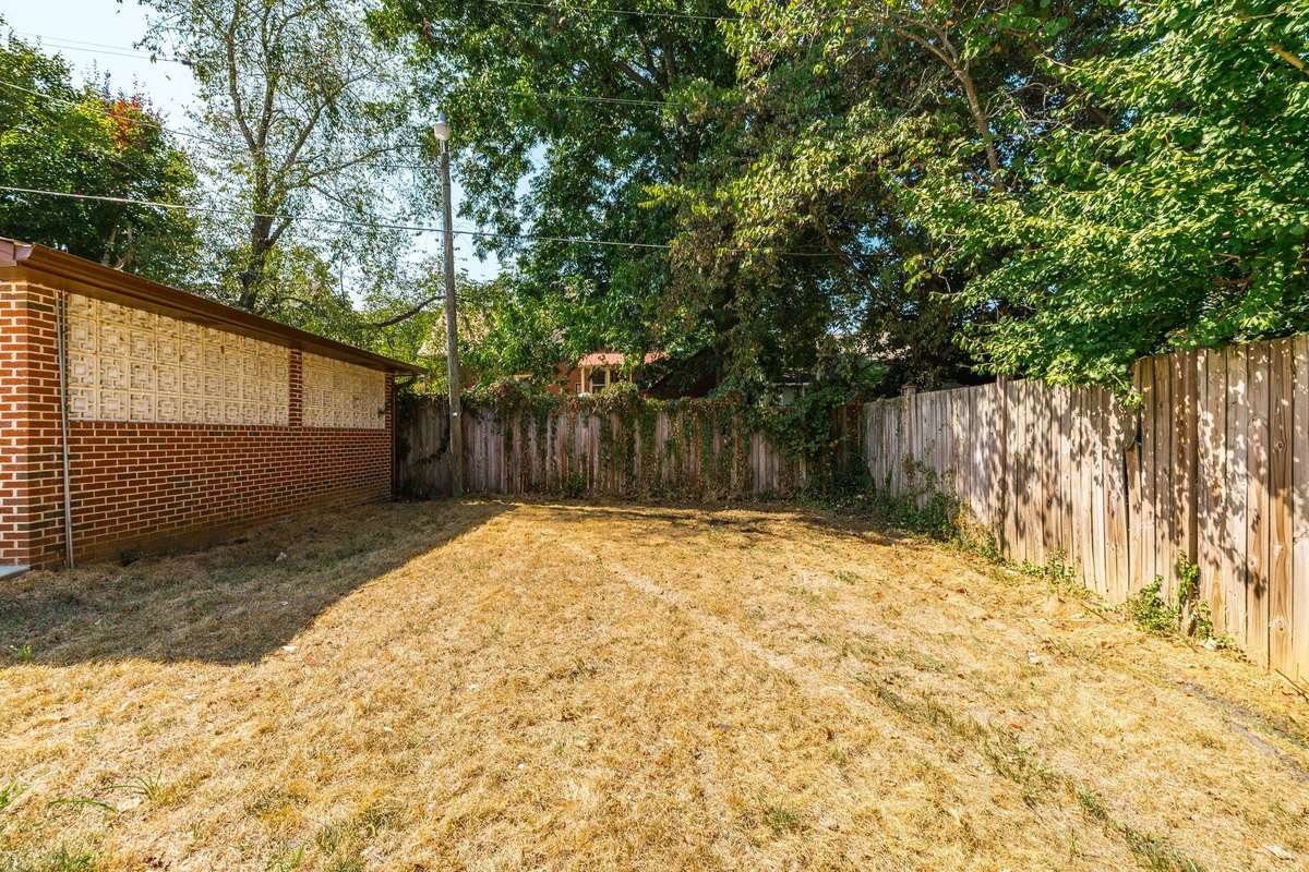 The back yard is spacious and private and ready for you to customize it to fit your needs.