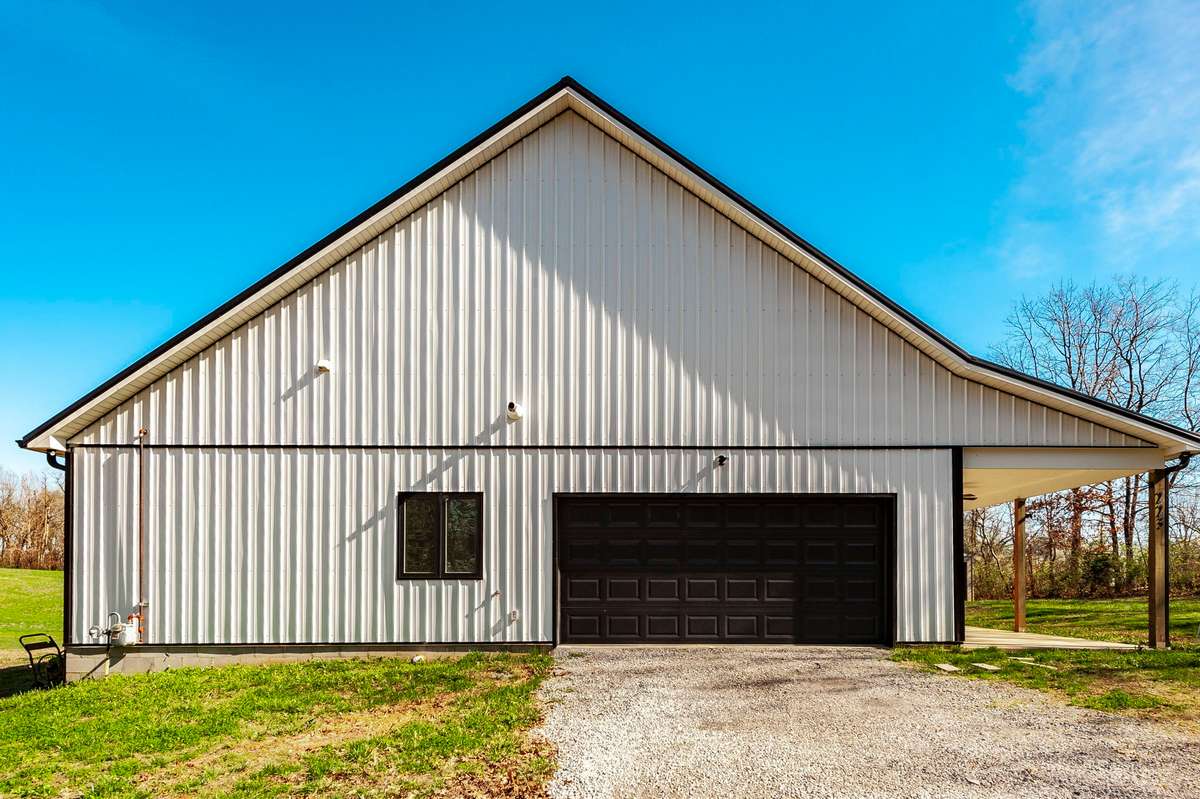 With ample space for vehicles and storage, this garage keeps your belongings organized and easily accessible.