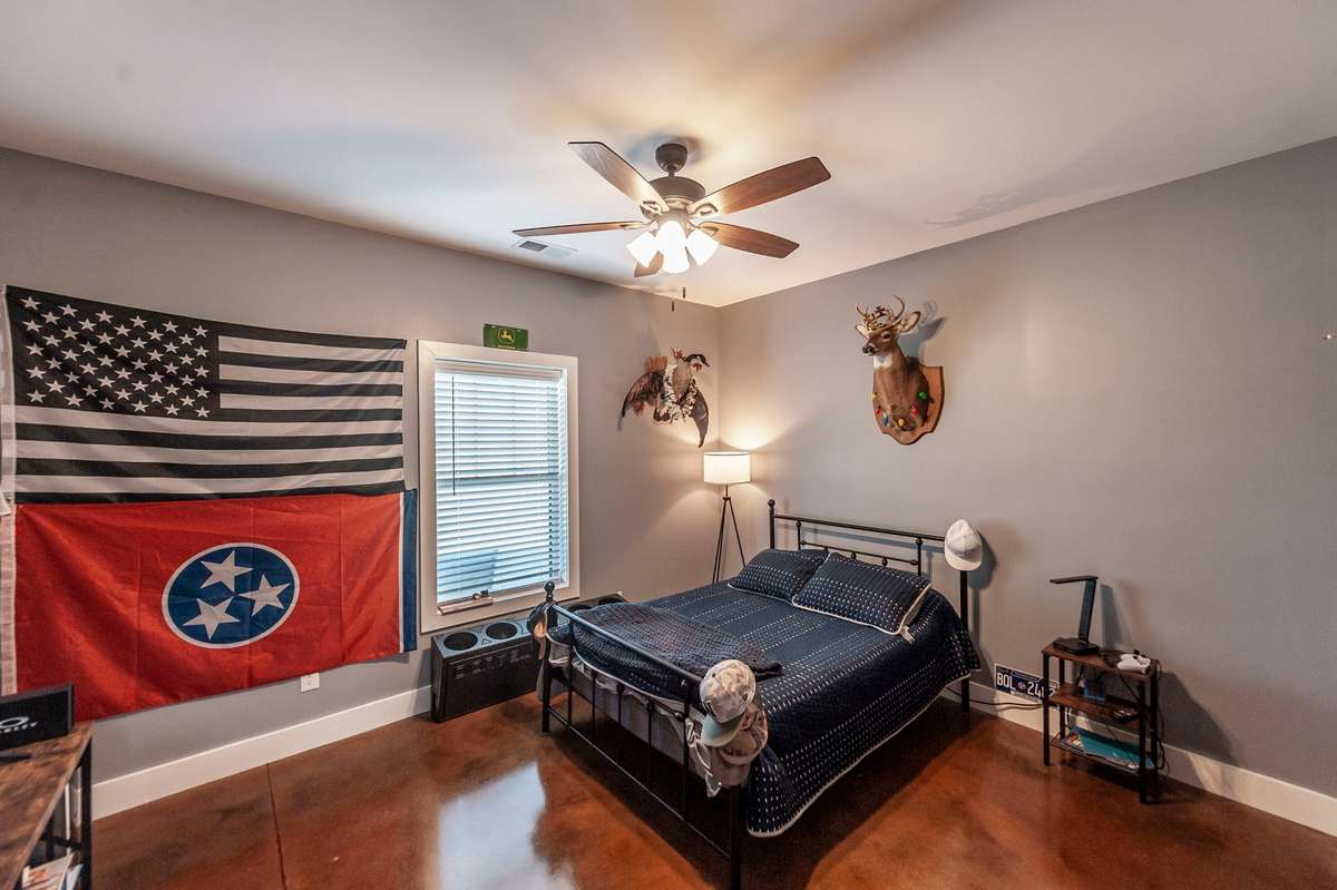 Both guest rooms are generously sized, offering comfortable spaces for family or visitors.