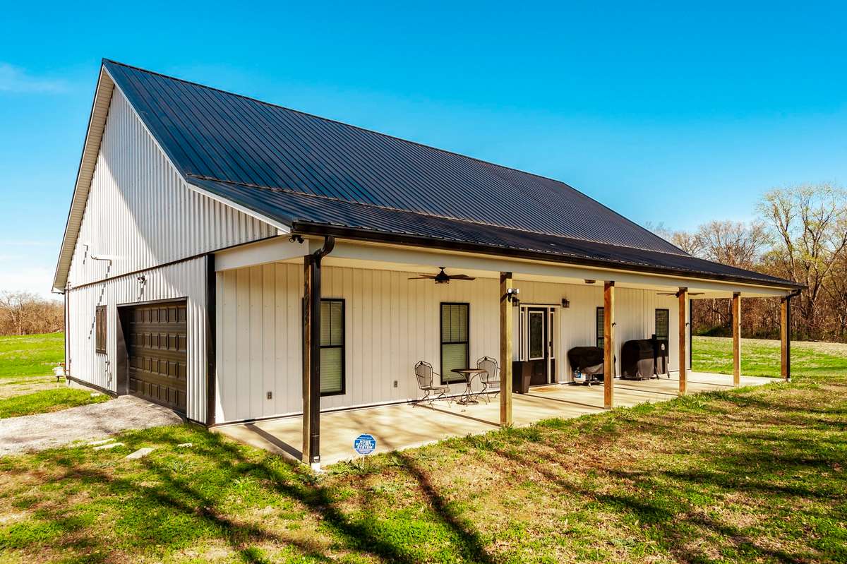 The full-length front porch stretches across the home and offers the perfect spot for rocking chairs, a porch swing, and relaxing afternoons.