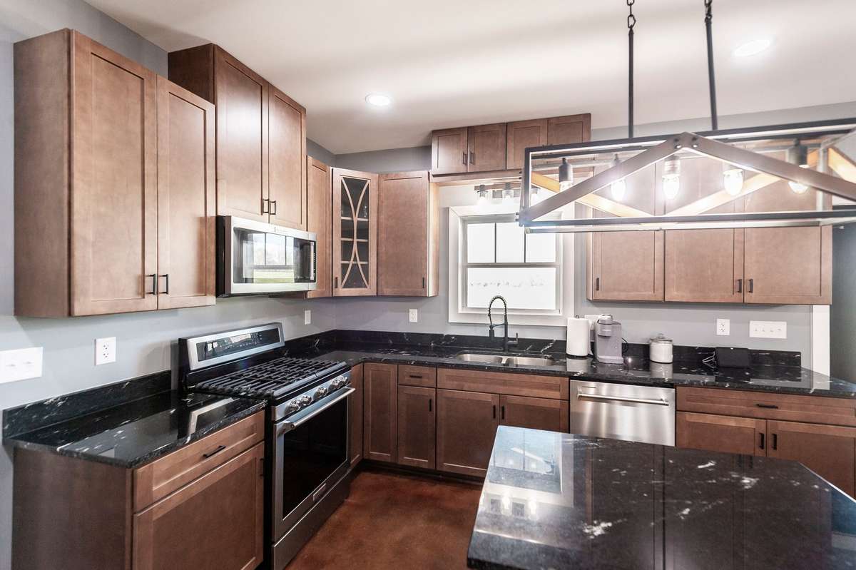 With its open layout and convenient design, the kitchen makes daily routines simple while still offering a great space to host family and friends.