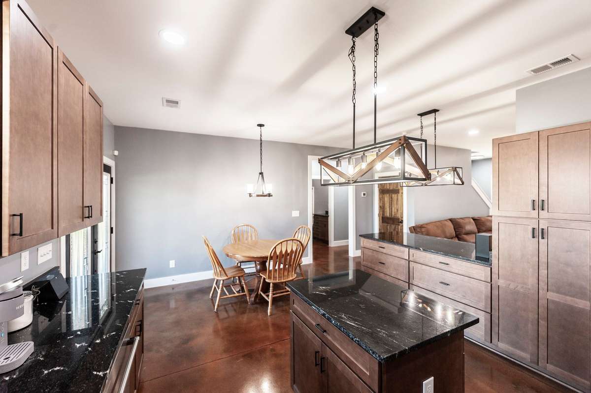 Natural light fills the kitchen and dining area, creating a bright and cheerful place to cook and gather.