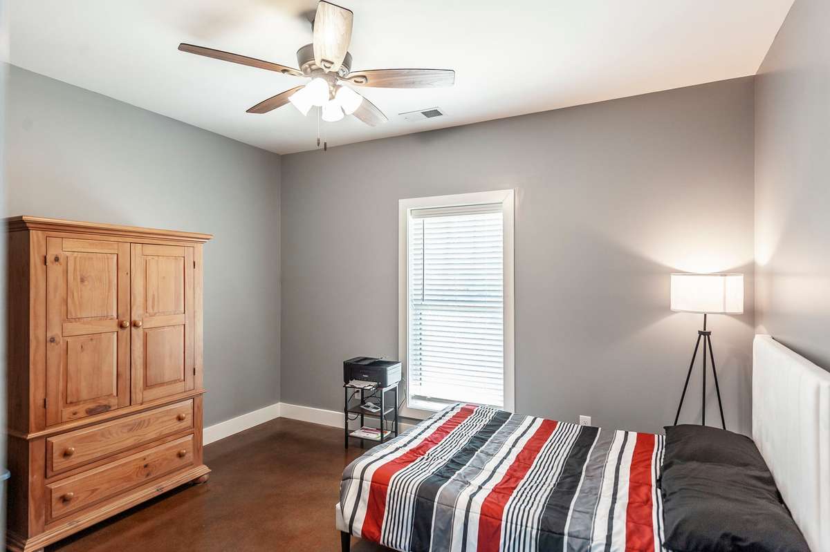 Neutral finishes and spacious layouts allow for flexible use, whether as bedrooms, offices, or hobby spaces.