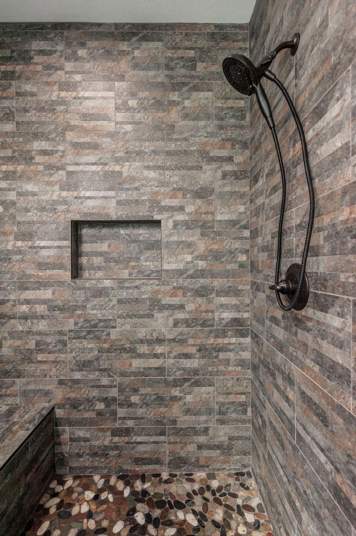 With a balance of functionality and luxury, this primary bath feels like a personal retreat within the home.