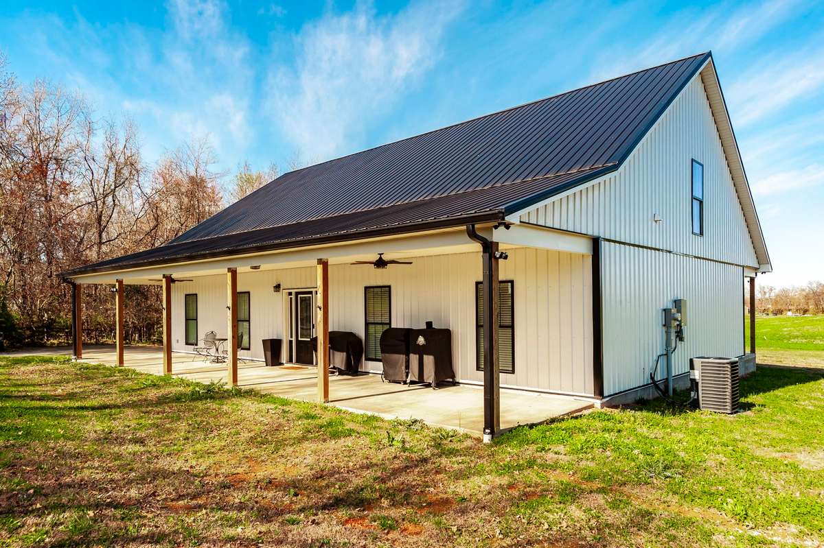 This beautiful modern farmhouse combines timeless design with a warm, welcoming presence, perfectly set on 1.35 peaceful acres.