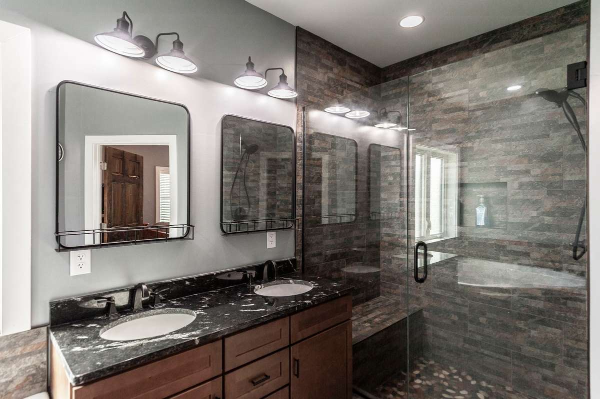 Double vanities with ample counter space provide convenience and style for daily routines.