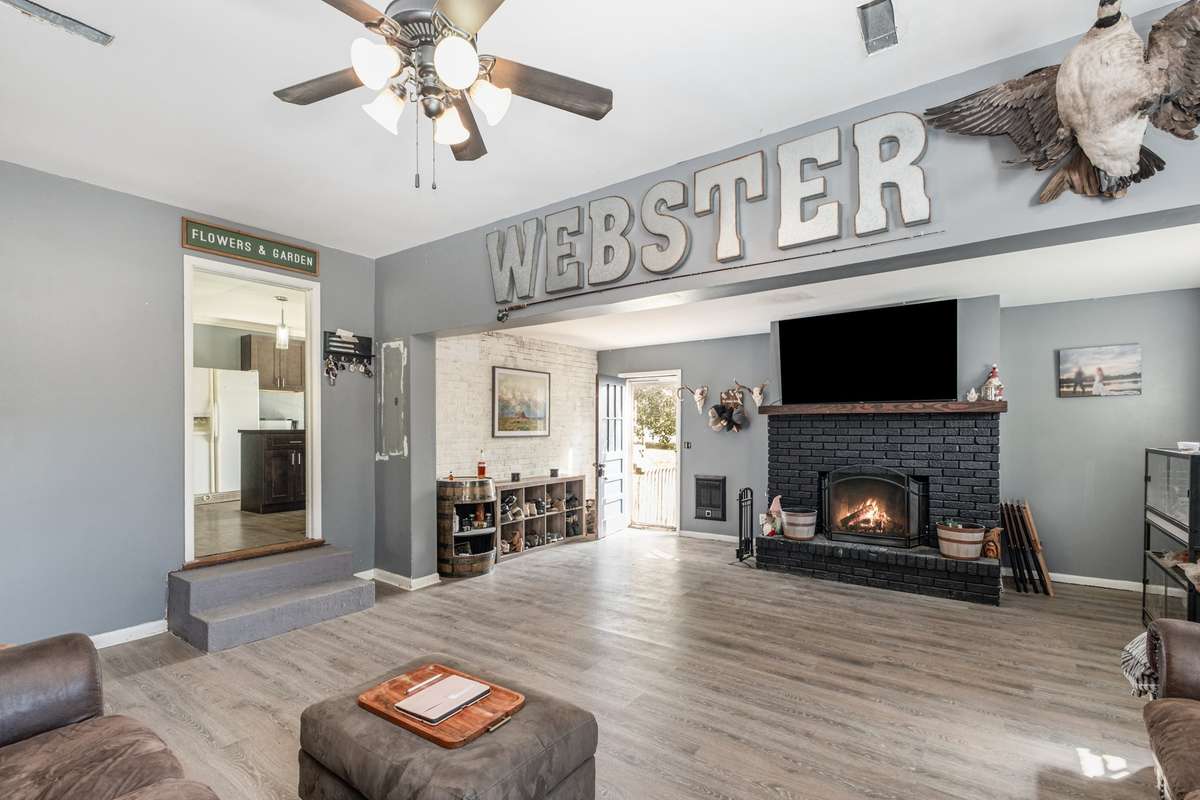 Great Room with entry door and door to kitchen.