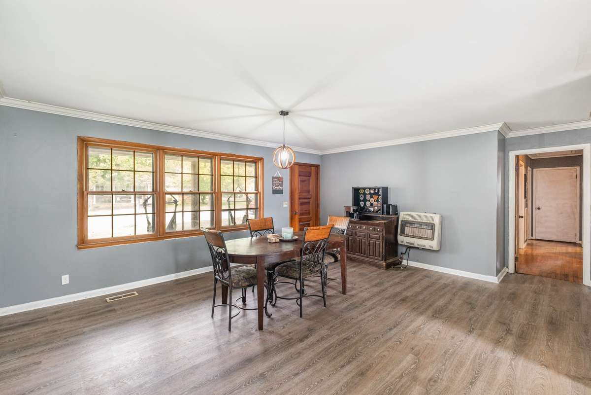 Dining Room looking to front door and hallway to bedrooms