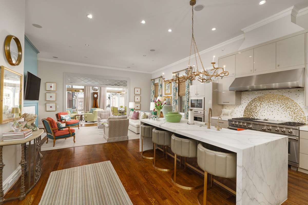 Centrally located, this awesome kitchen flows into the living room and adjoining sunroom
