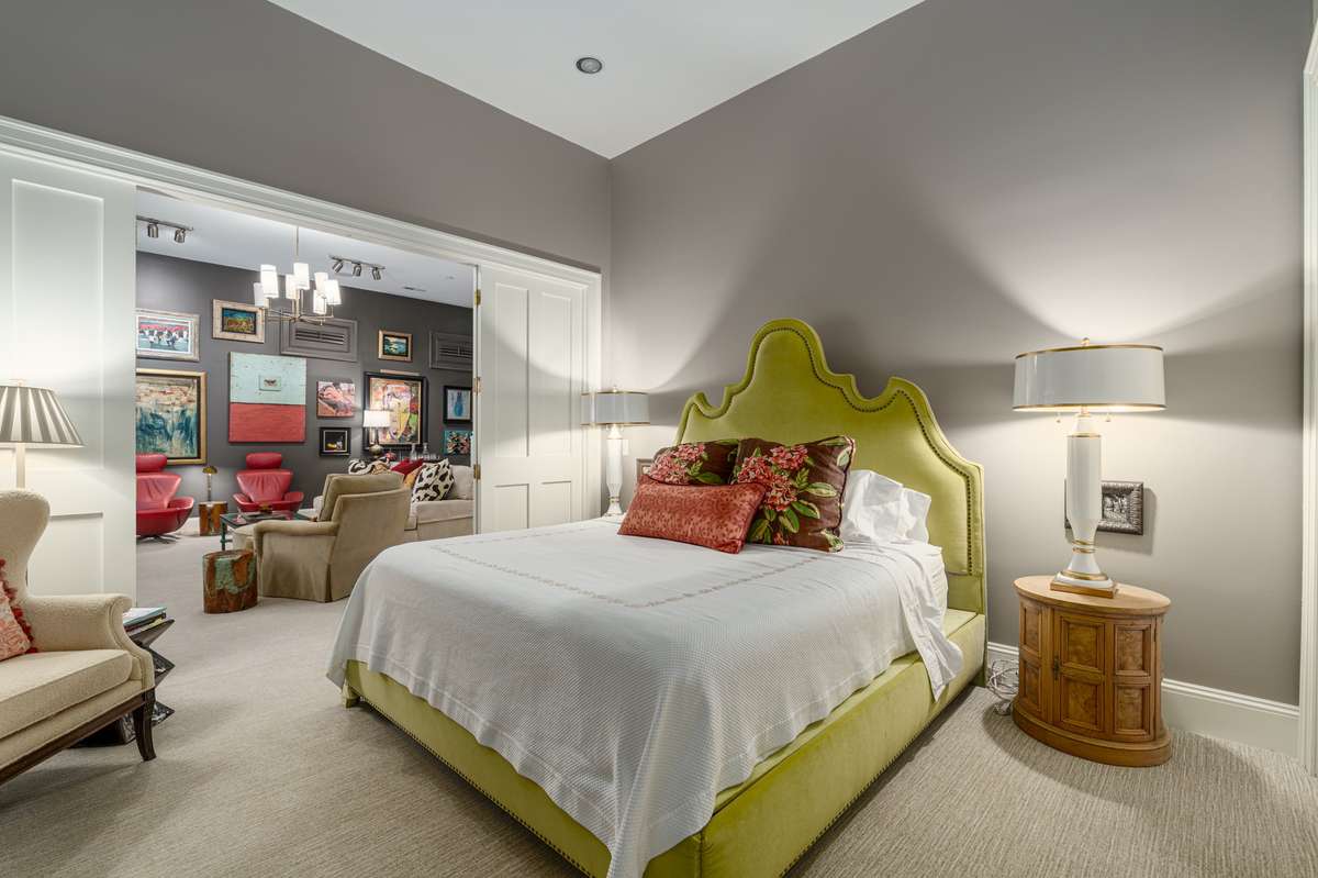 Media Room and Bedroom separated by beautifully crafted folding doors.