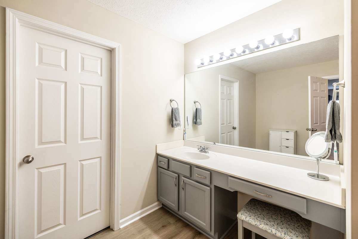 The luxury vinyl plank was added to both upstairs bathrooms as well!