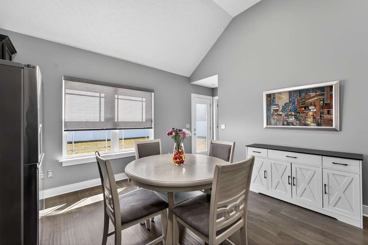 The large windows give a wonderful view of the large fenced back yard while sitting inside in comfort.