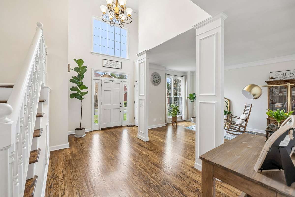 The entry makes a great first impression with soaring ceilings, beautiful hardwood floors and classic trim work! 1407 Ottawa Place, Murfreesboro, TN 37129