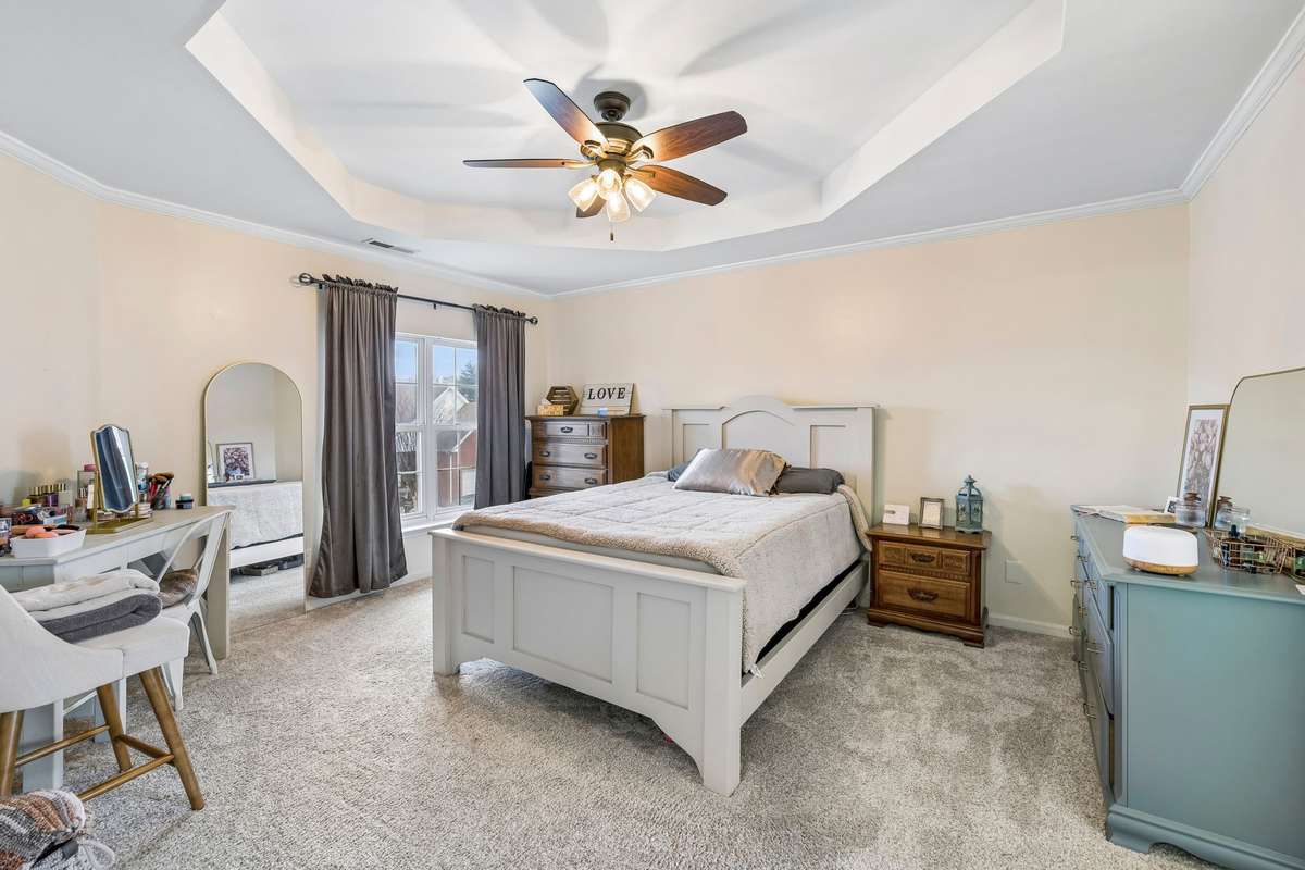 Relaxing primary bedroom retreat with generous space for furnishings and direct access to the ensuite bath! 1407 Ottawa Place, Murfreesboro, TN 37129