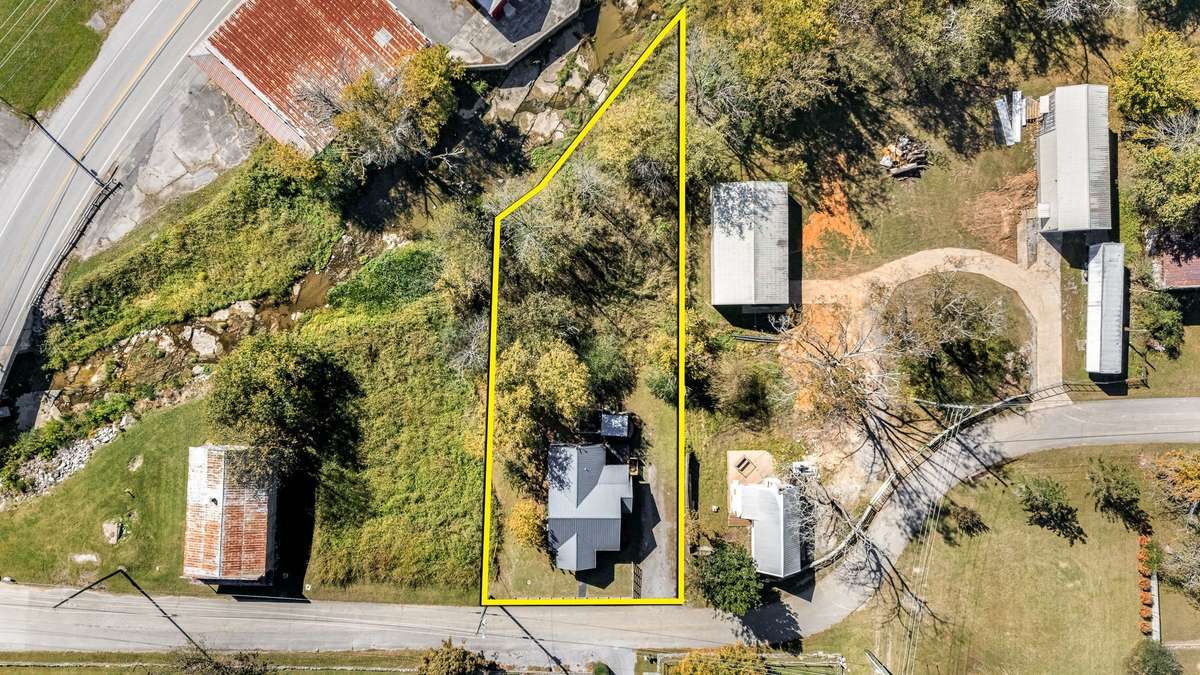 Backs to beautiful Marshall Creek. Property is in a flood plain, but the owner's current policy is transferrable to the Buyer. $2,228 annually.