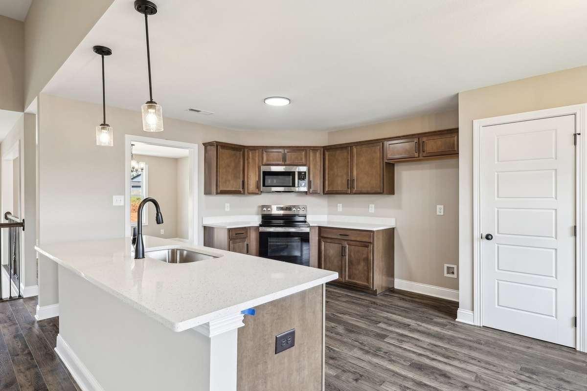 Sample pictures from a previous build showing the Oakmont Floor Plan. Materials and colors are subject to change without notice.