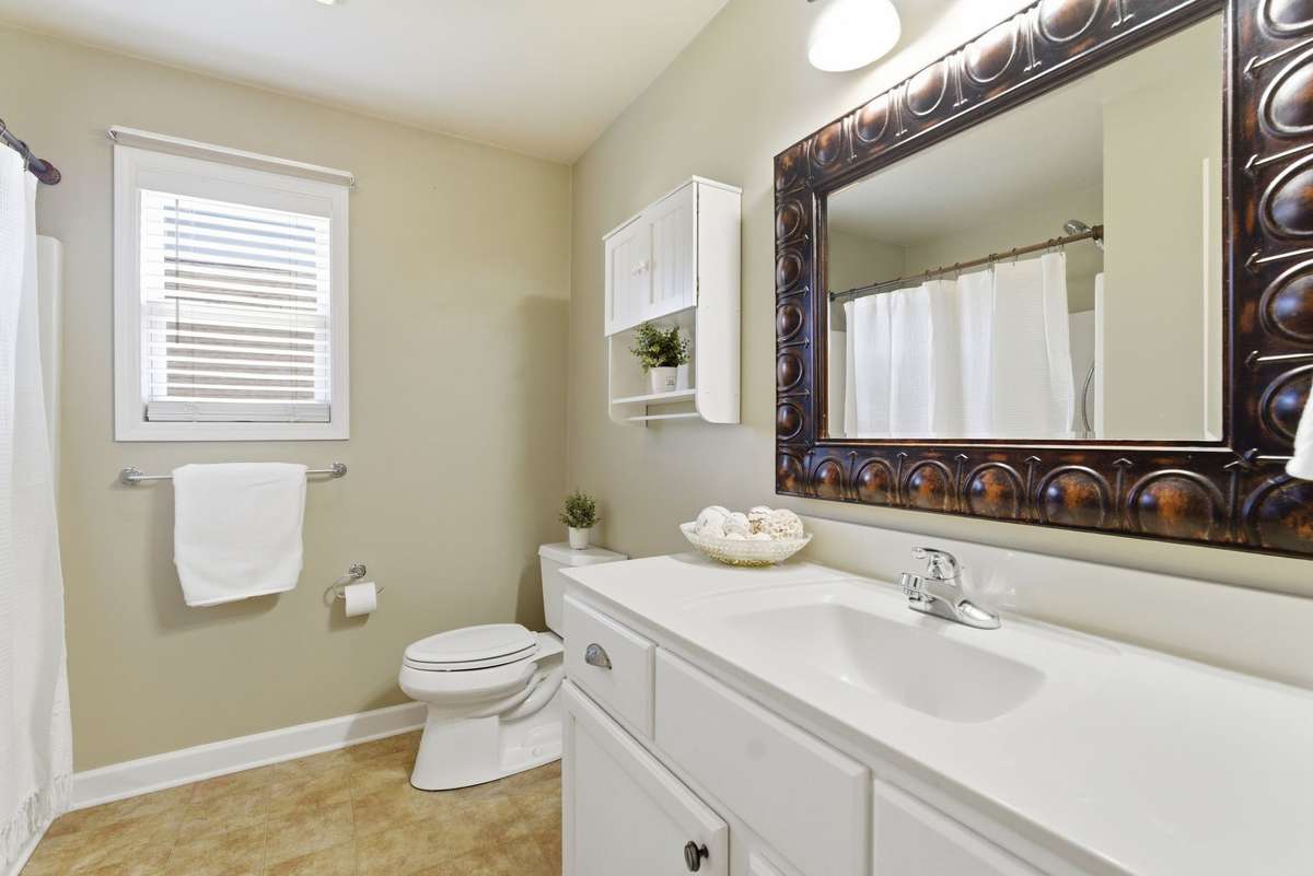 Guest hall bath is shared between bedroom 3 and 4