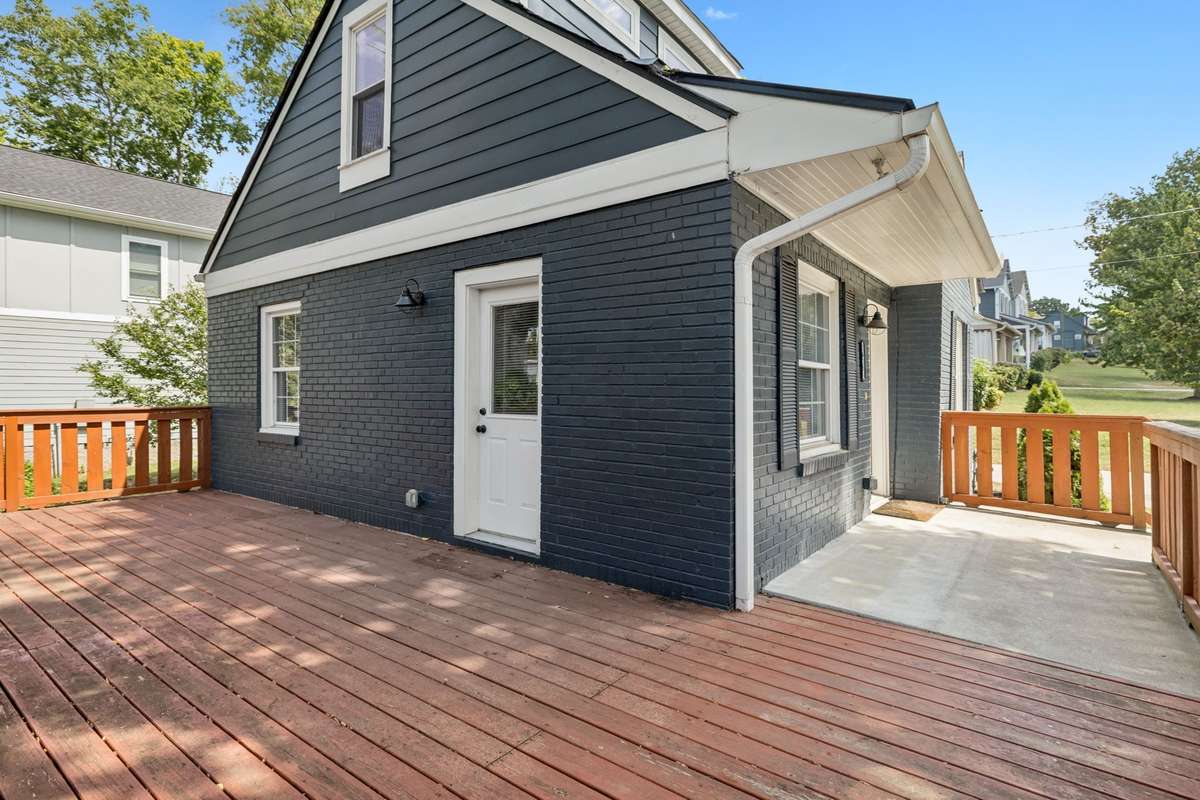 Inviting front stoop, with room for chairs and perfect for enjoying your morning coffee.
