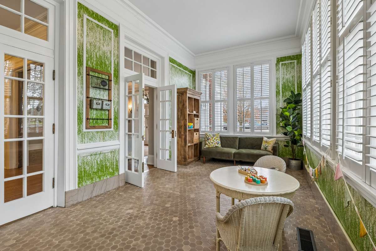 The "Sunporch" offers a light filled room perfect for afternoon tea, or a relaxing afternoon nap! Currently used as a playroom!