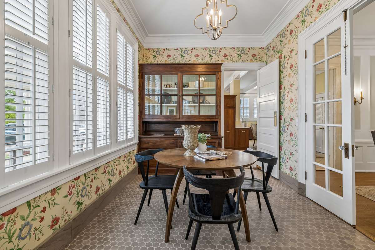 This charming room can function as a game room, office, morning room or ???