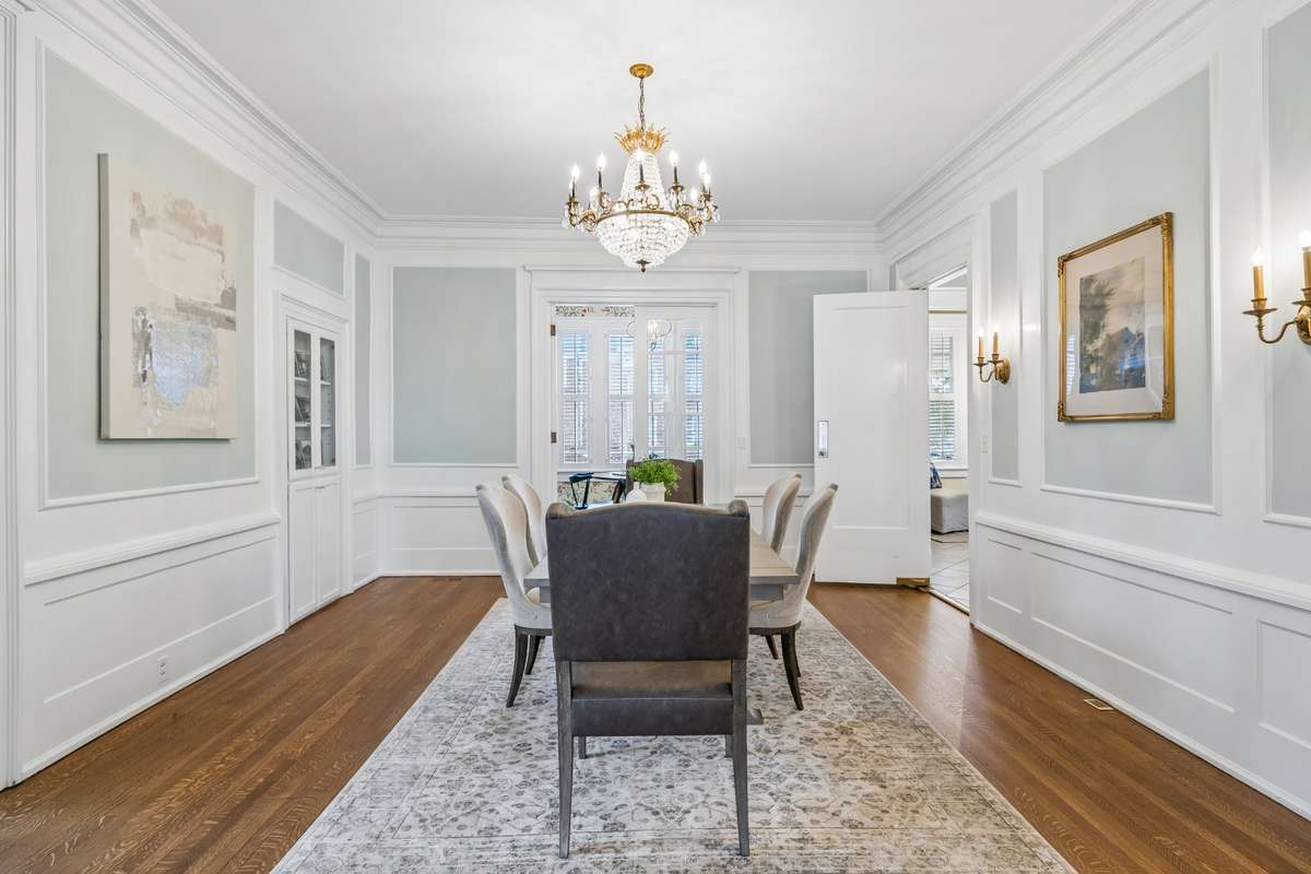 The gracious formal dining room with built-in cabinets, tall ceilings, extensive millwork are
a delight to see!