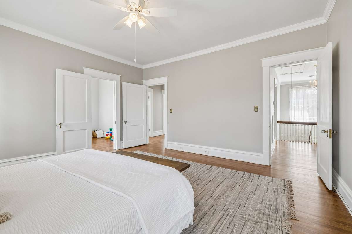 another view of how the center rear upstairs bedroom opens to back center hall bath and flex room